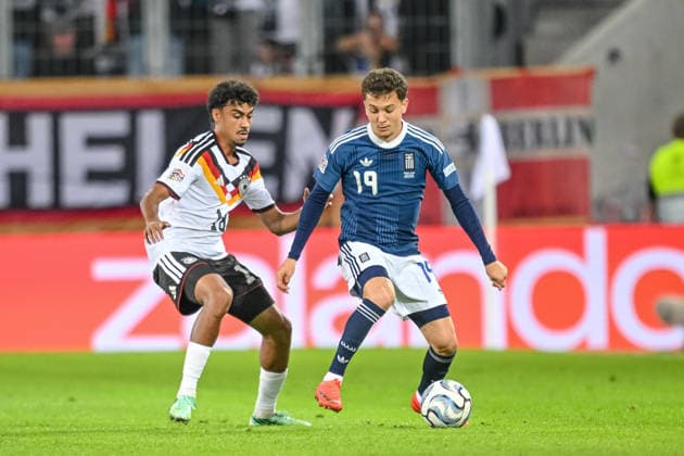 Nathaniel Brown of Germany and Konstantinos Karetsas of Greece battle for the ball during the UEFA Nations League 2026 Group 27 group stage match between Germany and Greece at WWK Arena on September 27, 2026, in Augsburg, Germany. Photo by Harry Langer, DeFodi Images
