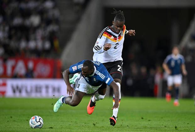 Tackle, Action: Foul by Yann Aurel Bisseck (GER 02) against Andreas Tetteh (GRE 16) in the DFB international match between Germany (GER) and Greece (GRE) in the UEFA Nations League on September 27, 2026. DFL regulations prohibit any use of photographs as image sequencesENCES AND OR QUASI-VIDEO DFB international match Germany (GER) vs. Greece (GRE), UEFA Nations League