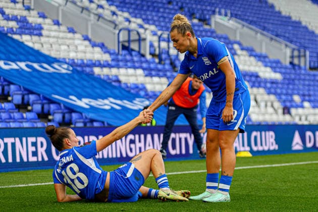 BIRMINGHAM, ENGLAND - September 27: Oceane Hurtre helps up Rebecca McKenna of Birmingham City during the Barclays Womens Super League football match between Birmingham City and Crystal Palace at St Andrews @ Knighthead Park on September 27, 2026 in Birmingham, England. (Photo by Natalie Mincher Sports Press Photo SPP) Copyright: xNataliexMincher SPPx Sportspressphoto_SPR241304