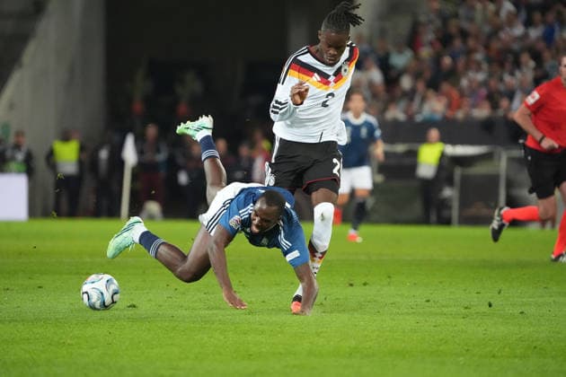 Yann Aurel Bisseck (Germany) goes head-to-head with Andreas Tetteh (Greece) in Augsburg on September 27, 2026; Germany vs. Greece, UEFA Nations League, WWK Arena, Matchday 2
