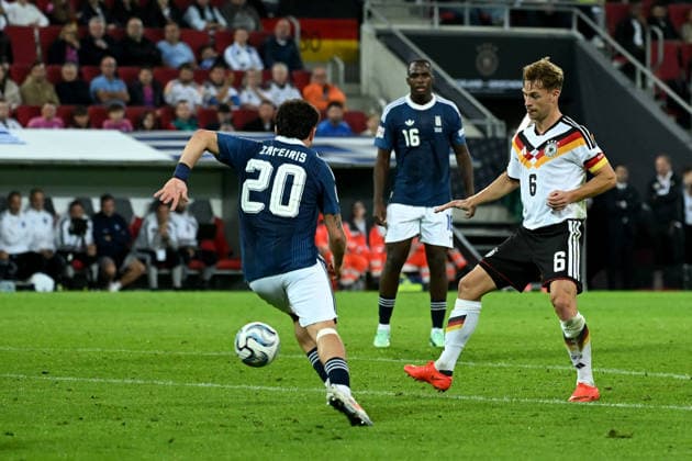 September 27, 2026, xemx, Soccer, UEFA Nations League, Germany vs. Greece, Christos Zafeiris (Greece) vs. Joshua Kimmich (German National Soccer Team, DFB), tackle, action, battle for the ball, Augsburg