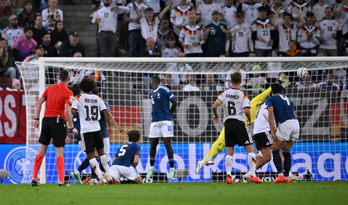Shot on goal, play, scoring chance: Karim Adeyemi (GER 19); goalkeeper Tzolakis (GRE 12); save. DFB international match: Germany (GER) vs. Greece (GRE), UEFA Nations League, September 27, 2026. DFL regulations prohibit any use of photographs as IMAGE SEQUENCES AND OR QUASI-VIDEO. DFB international match: Germany (GER) vs. Greece (GRE), UEFA Nations League
