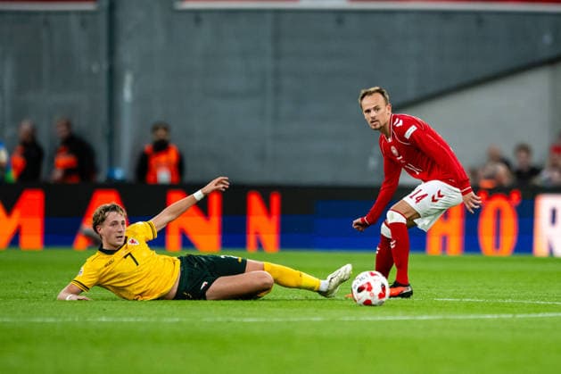 Denmark v Wales, UEFA Nations League, Copenhagen, Denmark Copenhagen, Denmark. 27th, September 2026. Mikkel Damsgaard (14) of Denmark and Charlie Savage (7) of Wales seen during the UEFA Nations League match between Denmark and Wales at Parken in Copenhagen. Denmark, Copenhagen, Parken  Copyright: xGonzalesxPhoto TobiasxJorgensenx