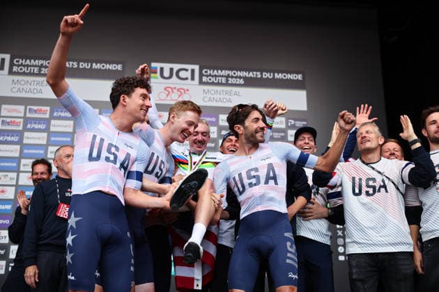 2026 UCI Road World Championships Picture by Alex Whitehead SWpix.com - 27 09 2026 - Cycling - 2026 UCI Road World Championships - MontrÃ al, Canada - Men Elite Road Race - Brandon Mcnulty (USA) celebrates winning to become World Champion with teammates on the podium Copyright: x xSWpix.comx(t axPhotographyxHubxLtd)xAlexxWhitehead SWpix.comx SWP-3521-5349