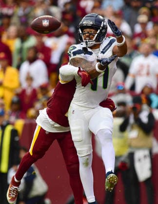 LANDOVER, MD - SEPTEMBER 27: Seahawks wide receiver Jaxon Smith-Njigba (11) catches his second touchdown catch of the game in the end zone during the fourth quarter while Washington cornerback Amik Robertson (2) covers him during the Seattle Seahawks versus Washington Commanders National Football League game at Northwest Stadium on September 27, 2026 in Landover, MD. (Photo by Randy Litzinger Icon Sportswire) NFL, American Football Herren, USA SEP 27 Seahawks at Commanders EDITORIAL USE ONLY Icon9662609270956