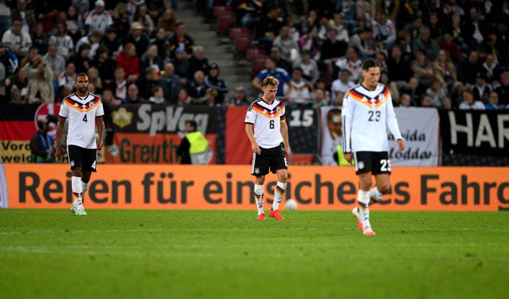 SOCCER UEFA Nations League League A Group 2 2026–2027 in Augsburg, September 27, 2026: Germany vs. Greece. Germany s disappointment: Jonathan Tah, Joshua Kimmich, Younes