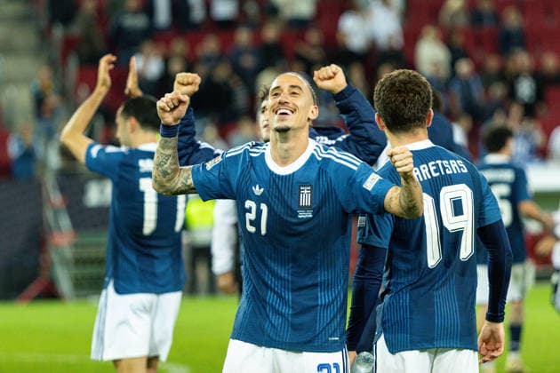Germany vs. Greece, UEFA Nations League, Matchday 2, 2026–27 Season, WWK Arena, Augsburg; Kostas Tsimikas of Greece, 21, celebrates with fans after the game; Augsburg WWK Arena, Bavaria, Germany Copyright: xBenedictxChristx