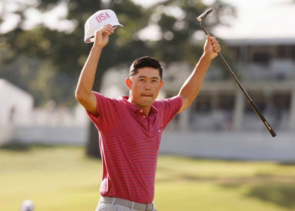 Collin Morikawa of the United States celebrates after winning his singles match against International team player Hideki Matsuyama of Japan on the final day of the 2026 President s Cup golf tournament at Medinah Country Club in Chicago, Illinois, on Sunday, September 27, 2026.  CHI20260927821 TANNENxMAURY
