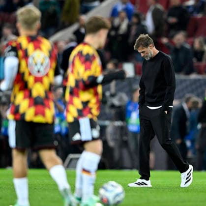Before the start of the game, German national team coach Jürgen Klopp (GER) watches the warm-up with his head down. DFB international match: Germany (GER) vs. Greece (GRE), UEFA Nations League, on September 27, 2026. DFL regulations prohibit any use of photographs as image seQUENCES AND OR QUASI-VIDEO. DFB international match: Germany (GER) vs. Greece (GRE), UEFA Nations League