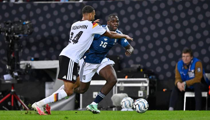 Tackle, Action: Josha Vagnoman (GER 14) vs. Andreas Tetteh (GRE 16) – DFB International Match: Germany (GER) vs. Greece (GRE) – UEFA Nations League on September 27, 2026. DFL regulations prohibit any use of photographs as image sequences and or QUASI-VIDEO DFB International Match: Germany (GER) vs. Greece (GRE), UEFA Nations League