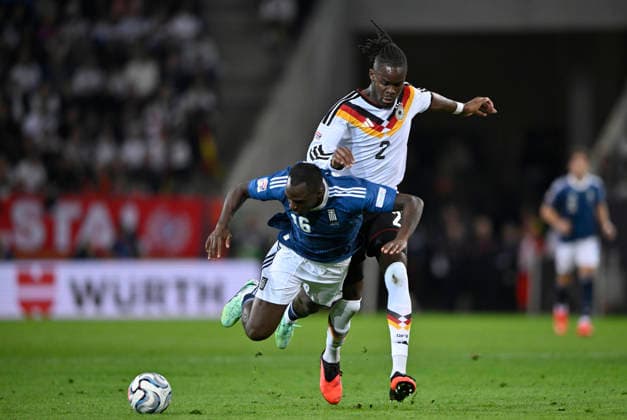 Tackle, Action: Foul by Yann Aurel Bisseck (GER 02) against Andreas Tetteh (GRE 16) in the DFB international match between Germany (GER) and Greece (GRE) in the UEFA Nations League on September 27, 2026. DFL regulations prohibit any use of photographs as image sequencesENCES AND OR QUASI-VIDEO. DFB international match: Germany (GER) vs. Greece (GRE), UEFA Nations League