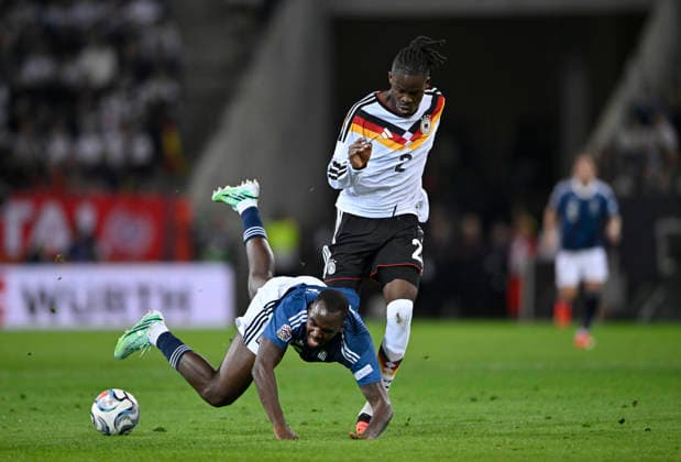 Tackle, Action: Foul by Yann Aurel Bisseck (GER 02) against Andreas Tetteh (GRE 16) in the DFB international match between Germany (GER) and Greece (GRE) in the UEFA Nations League on September 27, 2026. DFL regulations prohibit any use of photographs as image sequencesENCES AND OR QUASI-VIDEO. DFB international match: Germany (GER) vs. Greece (GRE), UEFA Nations League