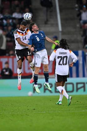 Heading duel, tackle, action: Josha Vagnoman (GER 14) vs. Fotis Ioannidis (GRE 08), Serge Gnabry (GER 20) – DFB international match: Germany (GER) vs. Greece (GRE) – UEFA Nations League on September 27, 2026. DFL REGULATIONS PROHIBITANY USE OF PHOTOGRAPHS AS IMAGE SEQUENCES AND OR QUASI-VIDEO DFB International Match: Germany (GER) vs. Greece (GRE) – UEFA Nations League