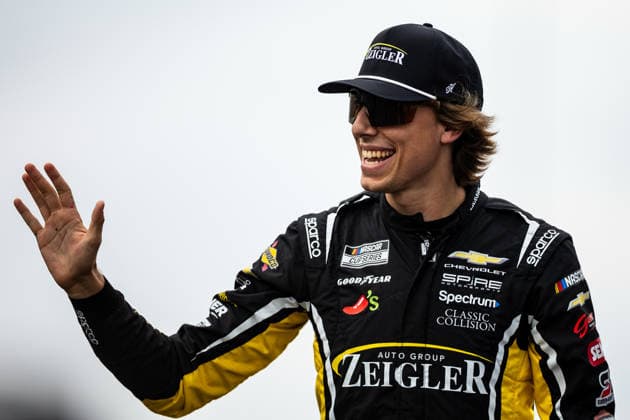 KANSAS CITY, KS - SEPTEMBER 27: Carson Hocevar ( 77 Spire Motorsports Chevrolet) waves to the fans during driver introductions before the NASCAR, Motorsport, USA Cup Series Playoffs Hollywood Casino 400 on Sunday, September 27, 2026, at Kansas Speedway in Kansas City, KS. (Photo by Kyle Ocker Icon Sportswire) AUTO: SEP 27 NASCAR Cup Series Playoffs Hollywood Casino 400 EDITORIAL USE ONLY Icon260926001