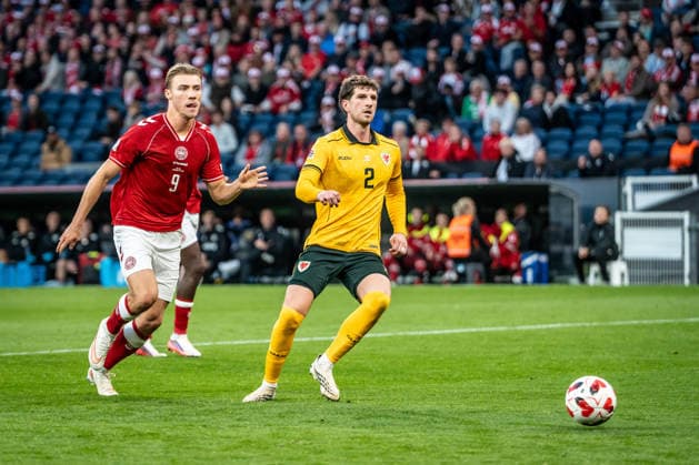 Denmark v Wales, UEFA Nations League, Copenhagen, Denmark Copenhagen, Denmark. 27th, September 2026. Rasmus Hojlund (9) of Denmark and Chris Mepham (2) of Wales seen during the UEFA Nations League match between Denmark and Wales at Parken in Copenhagen. Denmark, Copenhagen, Parken  Copyright: xGonzalesxPhoto NicolaixBethelsenx