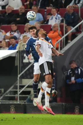 Heading duel: Josha Vagnoman (Germany) vs. Andreas Tetteh (Greece), Augsburg, September 27, 2026; Germany vs. Greece, UEFA Nations League, WWK Arena, Matchday 2