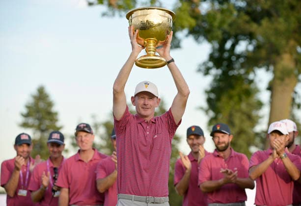 US Team Captain Brandt Snedeker raises the winners trophy after the United States team defeated the International Team 15.5 to 12.5 in the 2026 Presidents Cup at Medinah Country Club in Chicago, Illinois, on Sunday, September 27, 2026.  CHI20260927845 MARKxBLACK