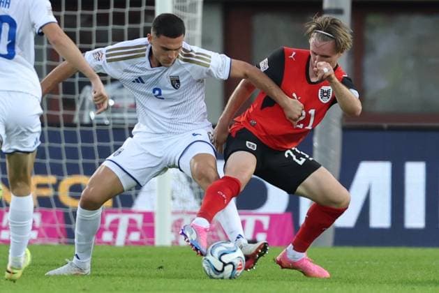 27.09.2026 - SOCCER - 2026 27 UEFA NATIONS LEAGUE, League B - Group B3, Round 2, Austria vs Kosovo Ron Raci (Kosovo) and Patrick Wimmer (Austria) in one-on-one Vienna Ernst-Happel-Stadion Vienna Austria Copyright: xYigitxOermexYigitxOermex