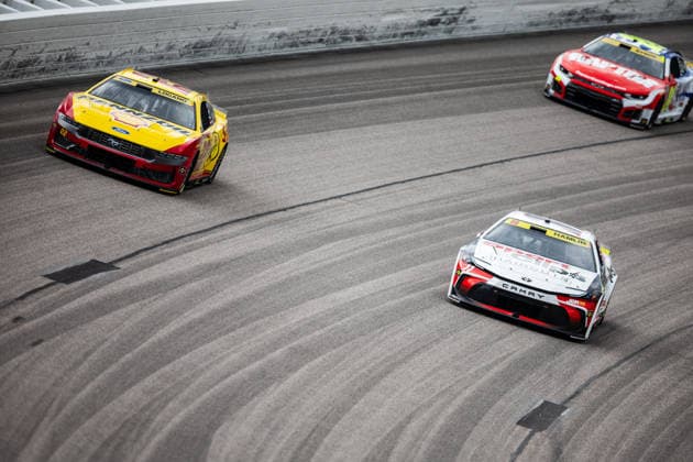 KANSAS CITY, KS - SEPTEMBER 27: Joey Logano ( 22 Team Penske Ford) and Denny Hamlin ( 11 Joe Gibbs Racing Toyota) race in turn one during the NASCAR, Motorsport, USA Cup Series Playoffs Hollywood Casino 400 on Sunday, September 27, 2026, at Kansas Speedway in Kansas City, KS. (Photo by Kyle Ocker Icon Sportswire) AUTO: SEP 27 NASCAR Cup Series Playoffs Hollywood Casino 400 EDITORIAL USE ONLY Icon260926028