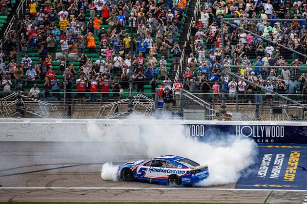 KANSAS CITY, KS - SEPTEMBER 27: Kyle Larson ( 5 Hendrick Motorsports Chevrolet) does a burnout on the frontstretch after winning the NASCAR, Motorsport, USA Cup Series Playoffs Hollywood Casino 400 on Sunday, September 27, 2026, at Kansas Speedway in Kansas City, KS. (Photo by Kyle Ocker Icon Sportswire) AUTO: SEP 27 NASCAR Cup Series Playoffs Hollywood Casino 400 EDITORIAL USE ONLY Icon260926041