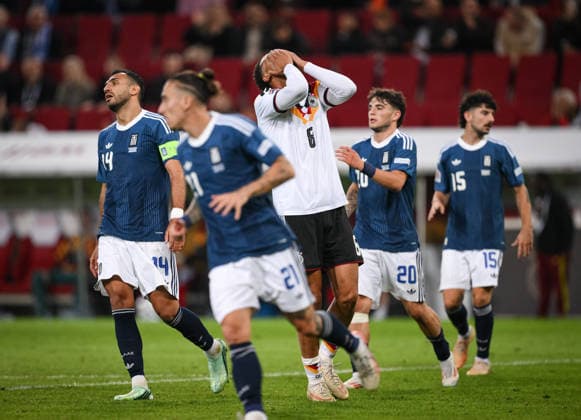 SOCCER UEFA Nations League League A Group 2 2026–2027 in Augsburg, September 27, 2026: Germany vs. Greece. Disappointment for Germany: Felix Nmecha (center) after a missed scoring opportunity; Vangelis Pavlidis (left), Greece