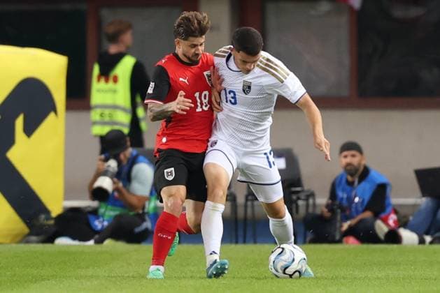 27.09.2026 - SOCCER - 2026 27 UEFA NATIONS LEAGUE, League B - Group B3, Round 2, Austria vs Kosovo Romano Schmid (Austria) and Dion Gallapeni (Kosovo) in one-on-one Vienna Ernst-Happel-Stadion Vienna Austria Copyright: xYigitxOermexYigitxOermex