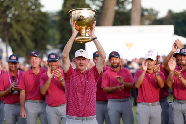 MEDINAH, IL - SEPTEMBER 27: United States captain Brandt Snedeker hoists the Presidents Cup over his head during the trophy presentation and closing ceremony of the Presidents Cup, September 27, 2026, at Medinah Country Club in Medinah, Illinois. (Photo by Matthew Maxey Icon Sportswire) GOLF: SEP 27 Presidents Cup EDITORIAL USE ONLY Icon260927060