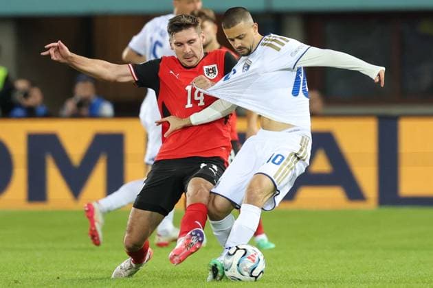 27.09.2026 - SOCCER - 2026 27 UEFA NATIONS LEAGUE, League B - Group B3, Round 2, Austria vs Kosovo Christoph Lang (Austria) and Edon Zhegrova (Kosovo) in one-on-one Vienna Ernst-Happel-Stadion Vienna Austria Copyright: xYigitxOermexYigitxOermex