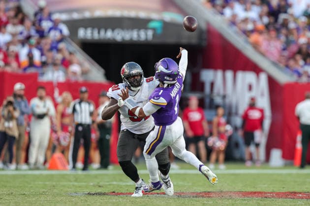 Sep 27, 2026; Tampa, FL, USA; Minnesota Vikings quarterback Kyler Murray (1) throws a pass while under pressure by Tampa Bay Buccaneers defensive lineman A Shawn Robinson (91) during an NFL, American Football Herren, USA football game between the Minnesota Vikings and Tampa Bay Buccaneers at Raymond James Stadium in Tampa, Florida. The Vikings defeated the Buccaneers 23-16. Mandatory Credit: Taylor McFee-Cal Media NFL 2026: Vikings Vs Buccaneers SEP 27  - ZUMAc04_ 20260927_zma_c04_101 Copyright: xTaylorxMcfeex