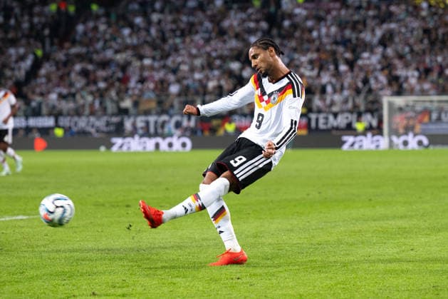 GER, Bavaria, Augsburg, Soccer, Germany vs. Greece, at the WWK Arena, Augsburg, UEFA Nations League, Matchday 2, Group Stage, September 27, 2026, From left: Kevin Schade, Germany, 9, portrait, single image, cutout, headshot, cross, shot, on the attack. DFL and DFB regulations prohibit any use of photographs as image sequences and or quasi-video, Copyright: HMB-Media MichaelxNibel