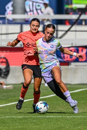SAN JOSE, CA - SEPTEMBER 27: Orlando Pride midfielder Luana Bertolucci Paixao (8) squeezes Bay FC defender Sydney Collins (16) for the ball during the Latino Heritage match between Orlando Pride and Bay FC on Sunday, September 27, 2026 at PayPal Stadium in San Jose, California. (Photo by Douglas Stringer Icon Sportswire) SOCCER: SEP 27 NWSL Bay FC vs Orlando Pride EDITORIAL USE ONLY Icon260927022