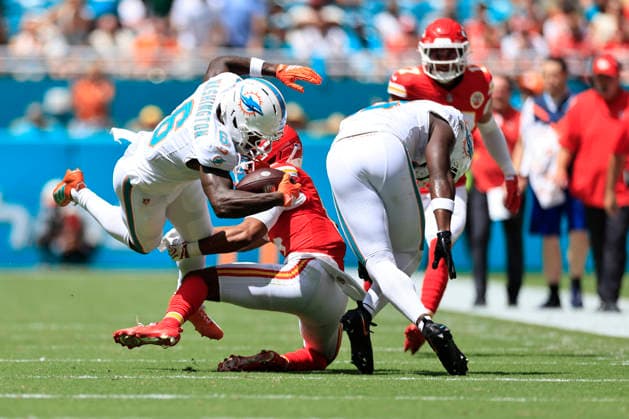 September 27, 2026, Miami Gardens, Florida, United States: Miami Dolphins wide receiver Malik Washington (6) is tackled by Kansas City Chiefs cornerback Mansoor Delane (5) during an NFL, American Football Herren, USA game against the Kansas City Chiefs on Sunday, September 27, 2026 at the Hard Rock Stadium. The Chiefs beat the Dolphins 24-10 in the home opener. NFL 2026: Kansas City Chiefs 24 : 10 Miami Dolphins  - ZUMAh180 20260927_zsp_h180_040 Copyright: xKimxHukarix