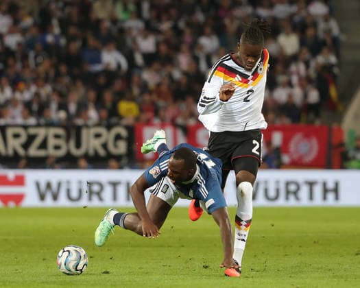 (260928) -- AUGSBURG, Sept. 28, 2026 -- Yann Bisseck (R) of Germany vies with Andreas Tetteh of Greece during the UEFA Nations League 2026 27 League A Group A match between Germany and Greece in Augsburg, Germany, Sept. 27, 2026. (Photo by Xinhua) (SP)GERMANY-AUGSBURG-UEFA NATIONS LEAGUE-LEAGUE A-GERMANY VS GREECE PhilippexRuiz 