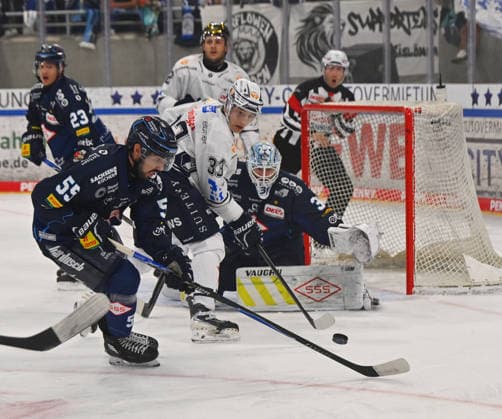 From left: Gregory Kreutzer, 55, Dresden; Nikita Kessler, Ravensburg; Goalie Marvin Berbner, 31, Dresden; Dresdner Eislöwen vs. Ravensburg Towerstars, ice hockey, Dresden, Eisloewen, DEL2, DEL 2, 2nd Division, 2026–2027 season, JOYNEXT Arena ice rink in Ostragehege, September 27, 2026,