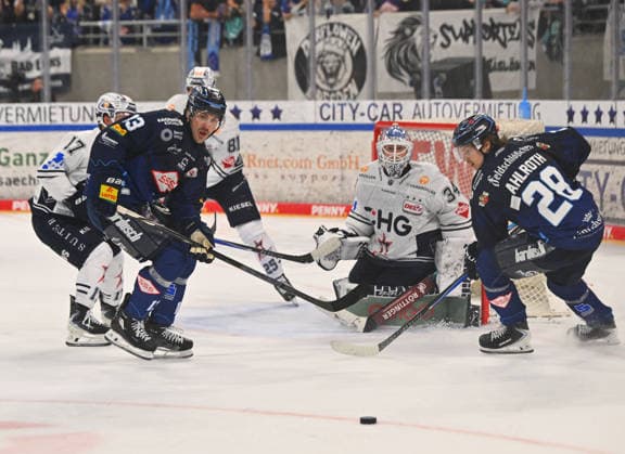 From left: Adam Helewka, 13, Dresden; goalie Konrad Fiedler, Ravensburg; Alec Ahlroth, 28, Dresden; Dresdner Eislöwen vs. Ravensburg Towerstars, ice hockey, Dresden, Eisloewen, DEL2, DEL 2, 2nd Division, 2026–2027 season, JOYNEXT Arena at Ostragehege, September 27, 2026,