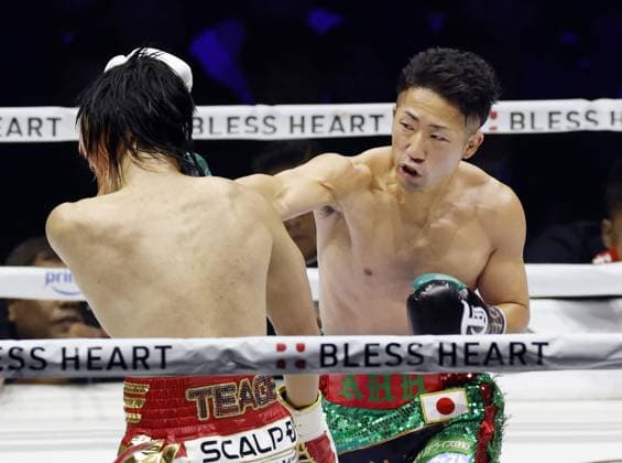 Boxing: Inoue vs. Nasukawa Takuma Inoue (R) of Japan throws a punch at compatriot ex-kickboxer Tenshin Nasukawa in the second round of their WBC bantamweight world title match at Toyota Arena Tokyo on Sept. 27, 2026. Inoue defended his title by unanimous decision.  A14AA0005629069P