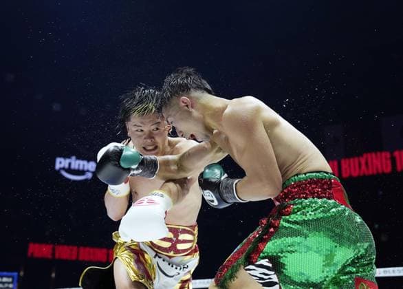Boxing: Inoue vs. Nasukawa Takuma Inoue (R) of Japan and compatriot ex-kickboxer Tenshin Nasukawa trade punches in the ninth round of their WBC bantamweight world title match at Toyota Arena Tokyo on Sept. 27, 2026. Inoue defended his title by unanimous decision.  A14AA0005629076P