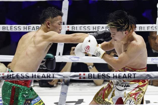 Boxing: Inoue vs. Nasukawa Takuma Inoue (L) of Japan throws a punch at compatriot ex-kickboxer Tenshin Nasukawa in the 11th round of their WBC bantamweight world title match at Toyota Arena Tokyo on Sept. 27, 2026. Inoue defended his title by unanimous decision.  A14AA0005629080P