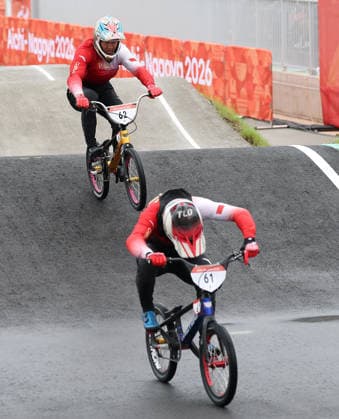 (260928) -- NAGOYA, Sept. 28, 2026 -- Lin Haochao (front) of China competes during the men final of cycling BMX racing at the 20th Asian Games Aichi-Nagoya 2026 in Nagoya, Japan, Sept. 28, 2026. ) (SP)JAPAN-NAGOYA-ASIAN GAMES-CYCLING BMX RACING-MEN-FINAL DengxHua 