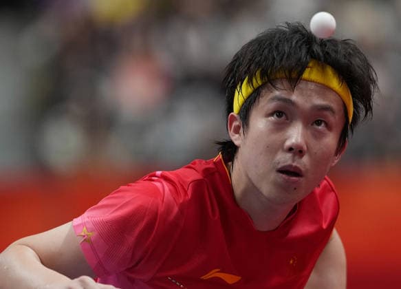 (260928) -- TOYOTA, Sept. 28, 2026 -- Wang Chuqin of China serves during the men s singles semifinals of Table tennis, Tischtennis against Noshad Alamiyan of Iran at the 20th Asian Games Aichi-Nagoya 2026 in Toyota of Aichi Prefecture, Japan, Sept. 28, 2026. ) (SP)JAPAN-TOYOTA-ASIAN GAMES-TABLE TENNIS-MEN S SINGLES WangxFei 