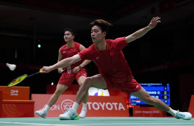 (260928) -- ICHINOMIYA, Sept. 28, 2026 -- Liang Weikeng Wang Chang (front) of China compete during the men s doubles semifinals of badminton against Fajar Alfian Muhammad Shohibul Fikri of Indonesia at the 20th Asian Games Aichi-Nagoya 2026 in Ichinomiya of Aichi Prefecture, Japan, Sept. 28, 2026. ) (SP)JAPAN-ICHINOMIYA-ASIAN GAMES-BADMINTON-MEN S DOUBLES LixBo 