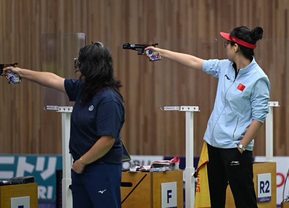 (260928) -- TOYOTA, Sept. 28, 2026 -- Xiao Jiaruixuan (R) of China and Esha Singh of India compete during the 25m pistol women individual final of shooting at the 20th Asian Games Aichi-Nagoya 2026 in Toyota of Aichi Prefecture, Japan, Sept. 28, 2026. ) (SP)JAPAN-TOYOTA-ASIAN GAMES-SHOOTING-25M PISTOL WOMEN INDIVIDUAL-FINAL LiuxLei 