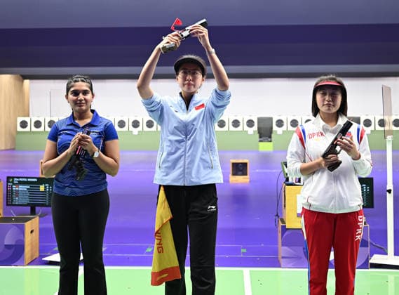 (260928) -- TOYOTA, Sept. 28, 2026 -- Xiao Jiaruixuan (C) of China, Esha Singh (L) of India, Kim Hyon Suk of the Democratic People s Republic of Korea (DPRK) react after the 25m pistol women individual final of shooting at the 20th Asian Games Aichi-Nagoya 2026 in Toyota of Aichi Prefecture, Japan, Sept. 28, 2026. ) (SP)JAPAN-TOYOTA-ASIAN GAMES-SHOOTING-25M PISTOL WOMEN INDIVIDUAL-FINAL LiuxLei 