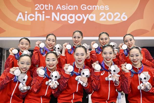 Aichi-Nagoya Asian Games: Artistic swimming Japanese artistic swimmers pose for a photo after winning the Aichi-Nagoya Asian Games mixed team silver at Hamamatsu Swimming Center in Hamamatsu in Shizuoka Prefecture, central Japan, on Sept. 28, 2026.  A14AA0005629167P