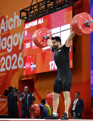 (260928) -- NAGOYA, Sept. 28, 2026 -- Ali Alipour of Iran competes during the men s 95kg final of weightlifting at the 20th Asian Games Aichi-Nagoya 2026 in Nagoya, Japan, Sept. 28, 2026. ) (SP)JAPAN-NAGOYA-ASIAN GAMES-WEIGHTLIFTING-MEN S 95KG-FINAL YuxYang 