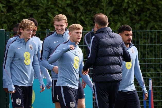 Lewis Hall of England with Thomas Tuchel manager of England during their training a session at Tottenham Hotspur Training Ground, Enfield. Picture date: 28th September 2026. Picture credit should read: David Klein Sportimage EDITORIAL USE ONLY. No use with unauthorised audio, video, data, fixture lists, club league logos or live services. Online in-match use limited to 120 images, no video emulation. No use in betting, games or single club league player publications. SPI_021_DK_England_Training SPI-5048-0021