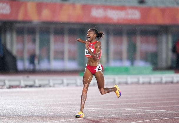 (260928) -- NAGOYA, Sept. 28, 2026 -- Winfred Yavi of Bahrain reacts after the women s 5000m final match of Athletics at the 20th Asian Games Aichi-Nagoya 2026 in Nagoya, Japan, Sept. 28, 2026. ) (SP)JAPAN-NAGOYA-ASIAN GAMES-ATHLETICS-WOMEN S 5000M JiaxYuchen 