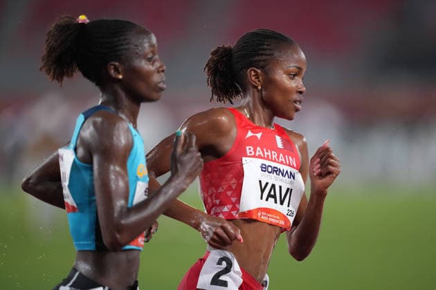 (260928) -- NAGOYA, Sept. 28, 2026 -- Winfred Yavi (R) of Bahrain competes during the women s 5000m final match of Athletics at the 20th Asian Games Aichi-Nagoya 2026 in Nagoya, Japan, Sept. 28, 2026. ) (SP)JAPAN-NAGOYA-ASIAN GAMES-ATHLETICS-WOMEN S 5000M JiaxYuchen 