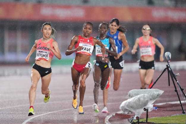 (260928) -- NAGOYA, Sept. 28, 2026 -- Winfred Yavi (2nd L) of Bahrain, Tanaka Nozomi (1st L) of Japan compete during the women s 5000m final match of Athletics at the 20th Asian Games Aichi-Nagoya 2026 in Nagoya, Japan, Sept. 28, 2026. ) (SP)JAPAN-NAGOYA-ASIAN GAMES-ATHLETICS-WOMEN S 5000M JiaxYuchen 