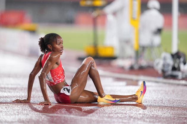 (260928) -- NAGOYA, Sept. 28, 2026 -- Winfred Yavi of Bahrain reacts after the women s 5000m final match of Athletics at the 20th Asian Games Aichi-Nagoya 2026 in Nagoya, Japan, Sept. 28, 2026. ) (SP)JAPAN-NAGOYA-ASIAN GAMES-ATHLETICS-WOMEN S 5000M LuixSiuxWai 